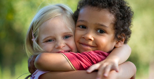 Two Children Hugging Danny Franks